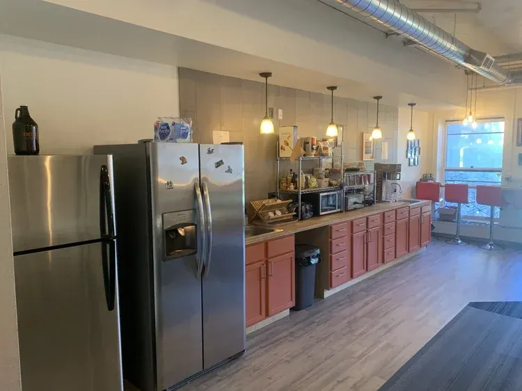 Fully equipped shared kitchen with full-size appliances